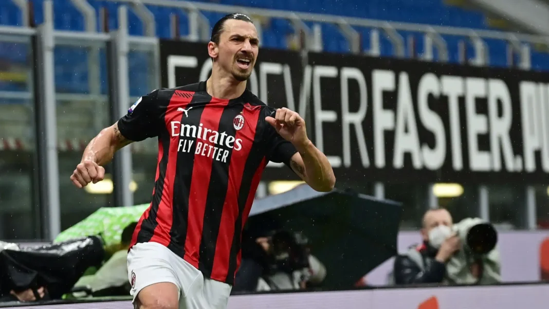 Zlatan Ibrahimovic écarte des joueurs à l’AC Milan Zlatan Ibrahimovic en action lors d'un match de football à l'AC Milan.