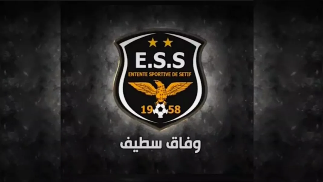 Logo de l'ES Sétif avec un aigle et étoiles.