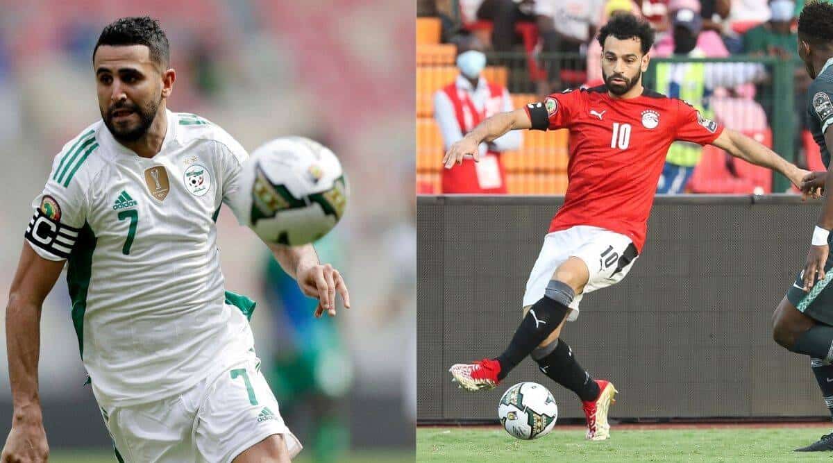 Salah et Mahrez en duel lors de la CAN 2025, concentrés sur le ballon.