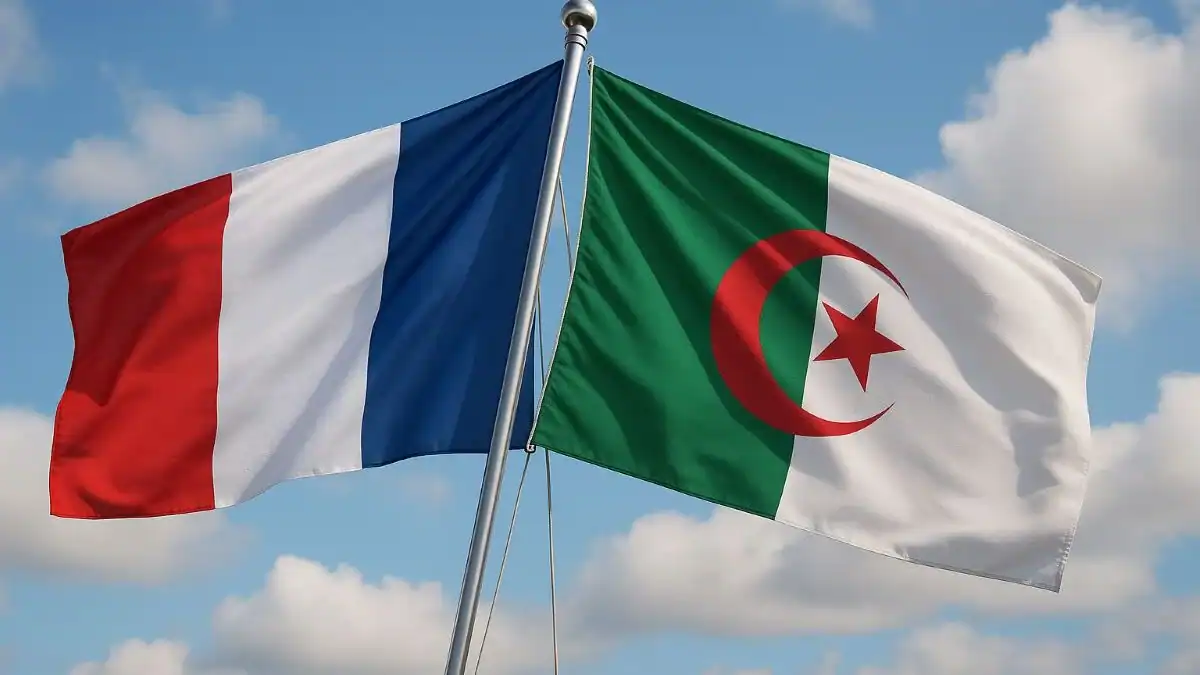 Une permanence consulaire algérienne exceptionnelle en France Drapeaux de la France et de l'Algérie flottant ensemble.