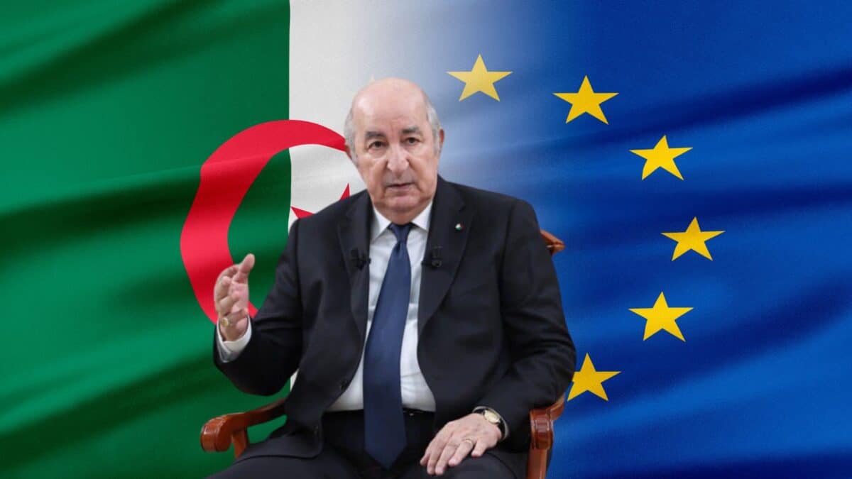 Algérie-UE : nouvelles avancées dans l’accord d’association Homme en costume devant les drapeaux d'Algérie et de l'Union européenne.