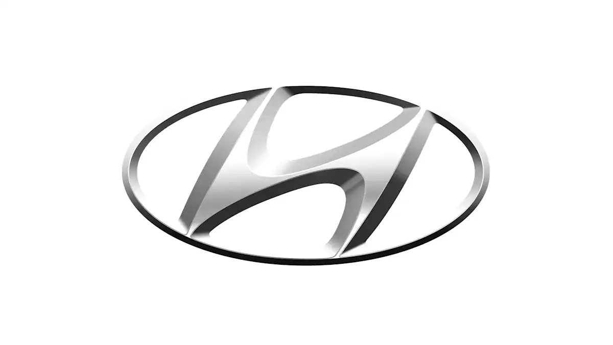 Logo Hyundai, symbole de l'industrie auto en Algérie.