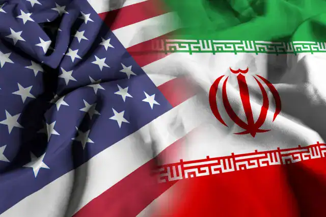 Trump face à l’Iran : la vraie raison de son recul soudain Drapeaux des États-Unis et d'Iran côte à côte, symbolisant la tension géopolitique.