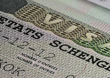 Visa Schengen belge avec détails et drapeau belge en haut à droite.